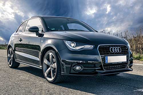 Lights-clouds-dark-car_(23698576464)